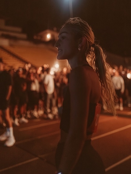 Athlete at a night race start line